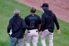 A member of the Miami Marlins staff and manager Don Mattingly, right, lead Starling Marte (6) away after Marte was hit by a pitch in the ninth inning of Game 1 of a National League wild-card baseball series against the Chicago Cubs in Chicago, Wednesday, Sept. 30, 2020. Marte left the game with an unknown injury. (AP Photo/Nam Y. Huh)
