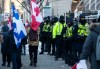 CP
First responders including Ottawa Police and Fire stand along Wellington Street as people participate in a rally against COVID-19 restrictions on Parliament Hill, which began as a cross-country convoy protesting a federal vaccine mandate for truckers, in Ottawa, on Saturday, Jan. 29, 2022. THE CANADIAN PRESS/Justin Tang