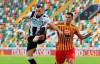 Lecce's Nehuén Paz, right, and and Udinese's Ilija Nestorovski vie for the ball during an Italian Serie A soccer match between Udinese and Lecce at the Dacia Arena stadium in Udine, Italy, Wednesday, July 29, 2020. (Andrea Bressanutti/LaPresse via AP)