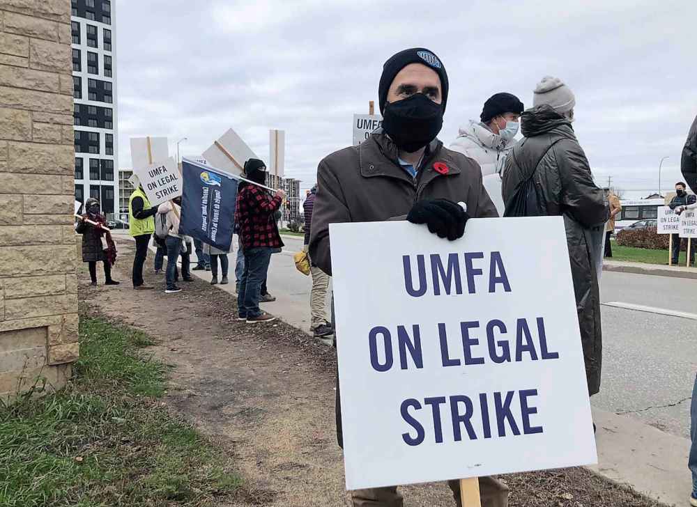 MAGGIE MACINTOSH / WINNIPEG FREE PRESS
Erik Thomson, an associate professor of history and vice-president of the faculty association at the University of Manitoba, was among dozens who joined picket lines across the city Tuesday — the first day of an academic strike at U of M.