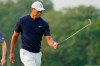 Tiger Woods prepares to putt on the first green during the first round of the US Open Golf Championship, Thursday, Sept. 17, 2020, in Mamaroneck, N.Y. (AP Photo/John Minchillo)