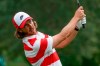 Tommy Fleetwood, of England, plays a shot out of the rough onto the 14th green during the first round of the US Open Golf Championship, Thursday, Sept. 17, 2020, in Mamaroneck, N.Y. (AP Photo/Charles Krupa)
