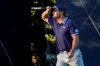 Bryson DeChambeau, of the United States, checks his lie on the 15th green during the third round of the US Open Golf Championship, Saturday, Sept. 19, 2020, in Mamaroneck, N.Y. (AP Photo/John Minchillo)