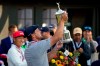 Bryson DeChambeau, of the United States, holds up the winner's trophy after winning US Open Golf Championship, Sunday, Sept. 20, 2020, in Mamaroneck, N.Y. (AP Photo/John Minchillo)
