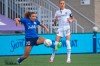 OL Reign forward Sofia Huerta (20) controls the ball as Portland Thorns midfielder Celeste Boureille (30) defends during the first half of an NWSL Challenge Cup soccer match at Zions Bank Stadium Monday, July 13, 2020, in Herriman, Utah. (AP Photo/Rick Bowmer)