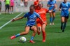 Chicago Red Stars' Sarah Gorden, front, plays the ball as Houston Dash's Bri Visalli defends during the second half of an NWSL Challenge Cup soccer finals match on July 26, 2020, in Sandy, Utah. Gordon aims to go beyond the social media statements, the T-shirts and the platitudes, and do something to lift up Black lives. The 28-year-old has put her focus on mental health for young women of color in launching her nonprofit organization, HoodSpace. (AP Photo/Rick Bowmer)
