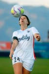 OL Reign forward Bethany Balcer (24) controls the ball during the first half of an NWSL Challenge Cup soccer match against the Sky Blue FC at Zions Bank Stadium on Tuesday, June 30, 2020, in Herriman, Utah. Balcer didn't come to the National Women's Soccer League by way of a powerhouse college program like North Carolina or UCLA. She didn't come to the league with a national team history or as a top draft pick, either. Balcer forged her own path to OL Reign. (AP Photo/Rick Bowmer)