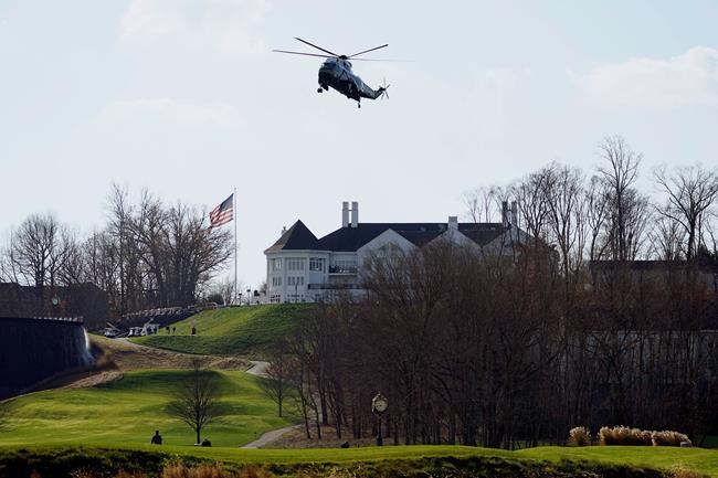 Marine One with President Donald Trump aboard lands at Trump National Golf Club, Saturday, Nov. 28, 2020, in Sterling, Va. (AP Photo/Alex Brandon)