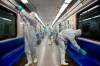 Workers disinfect subway trains against coronavirus in Tehran, Iran, in the early morning of Tuesday, Feb. 25, 2020. Iran's government said Tuesday that more than a dozen people had died nationwide from the new coronavirus, rejecting claims of a much higher death toll of 50 by a lawmaker from the city of Qom that has been at the epicenter of the virus in the country. (Sajjad Safari/IIPA via AP)