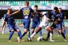 Verona’s Guenter Koray, right, challenges Atalanta's Duvan Zapata during the Serie A soccer match between Hellas Verona and Atalanta at the Marcantonio Bentegodi Stadium in Verona, Italy, Saturday, July 18, 2020. (Paola Garbuio/LaPresse via AP)
