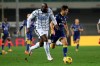 Inter Milan's Romelu Lukaku, left, controls the ball during the Serie A soccer match between Verona and Inter Milan in Verona, Italy Wednesday, Dec. 23, 2020. (Paola Garbuio/LaPresse via AP)