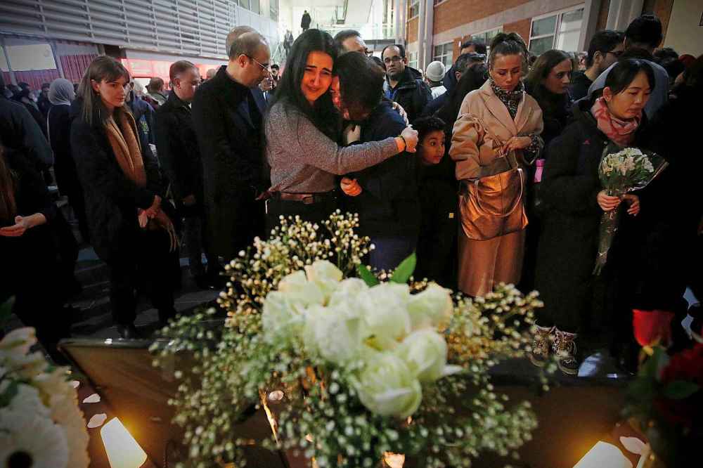 THE CANADIAN PRESS/John Woods
Ayda Mohammadian, right, is comforted by a friend as she weeps for her boyfriend Amir Hossein Ghorbani at a vigil for the Iranian crash victims at the University of Manitoba, Friday.