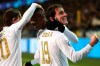 Real Madrid's Vinicius Junior, center, jubilates with teammate Real Madrid's Alvaro Odriozola, right, after scoring his sides second goal during the Champions League group A soccer match between Brugge and Real Madrid at the Jan Breydel stadium in Bruges, Belgium, Wednesday, Dec. 11, 2019. (AP Photo/Francisco Seco)