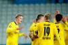 Dortmund's Erling Haaland, left, celebrates after scoring his sides third goal of the match during the Champions League Group F soccer match between Brugge and Borussia Dortmund at the Jan Breydel stadium in Bruges, Belgium, Wednesday, Nov. 4, 2020. (AP Photo/ Francisco Seco)