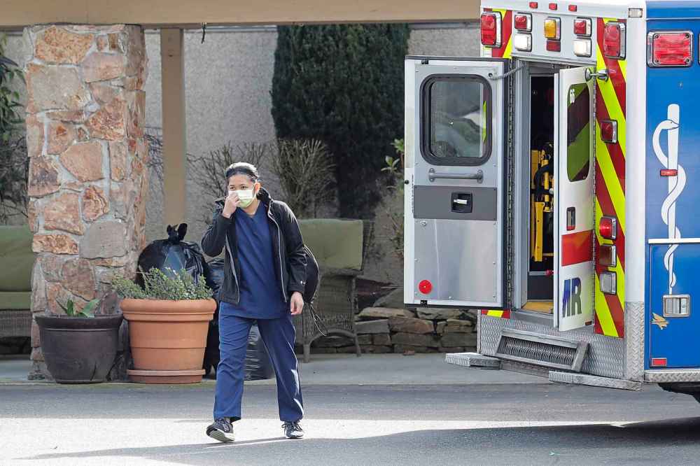 CP
A worker at the Life Care Center in Kirkland, Wash., which is at the centre of the outbreak of the COVID-19 coronavirus in Washington state. (Ted S. Warren / The Associated Press)