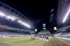 Minnesota United, right, and Seattle Sounders players walk onto the field and into an otherwise empty stadium before an MLS playoff Western Conference final soccer match, Monday, Dec. 7, 2020, in Seattle. (AP Photo/Ted S. Warren)
