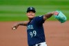 Seattle Mariners starting pitcher Taijuan Walker throws against the Los Angeles Dodgers in the second inning of a baseball game Wednesday, Aug. 19, 2020, in Seattle. (AP Photo/Elaine Thompson)