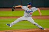 Los Angeles Dodgers starting pitcher Clayton Kershaw throws against the Seattle Mariners in the seventh inning of a baseball game Thursday, Aug. 20, 2020, in Seattle. (AP Photo/Elaine Thompson)