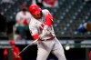 Los Angeles Angels' Mike Trout singles against the Seattle Mariners during the sixth inning of a baseball game Saturday, May 1, 2021, in Seattle. (AP Photo/Elaine Thompson)