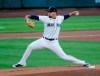 Seattle Mariners starting pitcher Justus Sheffield works against the Texas Rangers during the first inning of a baseball game, Saturday, Aug. 22, 2020, in Seattle. (AP Photo/John Froschauer)