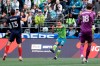 Seattle Sounders defender Miguel Ibarra (11) takes a shot as Chicago Fire midfielder Brandt Bronico, left, and goalkeeper Kenneth Kronholm, right, defend, during the first half of an MLS soccer match, Sunday, March 1, 2020, in Seattle. (AP Photo/Ted S. Warren)
