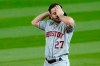 Houston Astros second baseman Jose Altuve wipes his forehead during a pause in the fifth inning of a baseball game against the Seattle Mariners, Wednesday, Sept. 23, 2020, in Seattle. (AP Photo/Ted S. Warren)