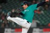 Seattle Mariners starting pitcher Yusei Kikuchi reacts after striking out San Francisco Giants' Austin Slater to end the top of the fifth inning of a baseball game Friday, April 2, 2021, in Seattle. (AP Photo/Ted S. Warren)