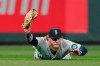 Seattle Mariners left fielder Jake Fraley makes a diving catch for an out on a line drive hit by Chicago White Sox's Yoan Moncada during the fifth inning of a baseball game, Tuesday, April 6, 2021, in Seattle. (AP Photo/Ted S. Warren)