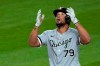 Chicago White Sox's Jose Abreu reacts as he crosses the plate after he hit a grand slam during the eighth inning of a baseball game against the Seattle Mariners, Tuesday, April 6, 2021, in Seattle. (AP Photo/Ted S. Warren)