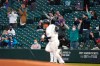 Fans wearing masks as a precaution against COVID-19, cheer as Seattle Mariners' Kyle Seager rounds the bases after hitting a solo home run against the Baltimore Orioles during the fourth inning of a baseball game, Tuesday, May 4, 2021, in Seattle. (AP Photo/Ted S. Warren)