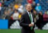 FILE - In this July 17, 2019, file photo, Seattle Sounders head coach Brian Schmetzer walks on the pitch before an international friendly soccer match against Borussia Dortmund in Seattle. The MLS soccer team announced Monday, Jan. 25, 2021, that the team and Schmetzer had reached agreement on a multiyear contract extension. (AP Photo/Ted S. Warren, File)