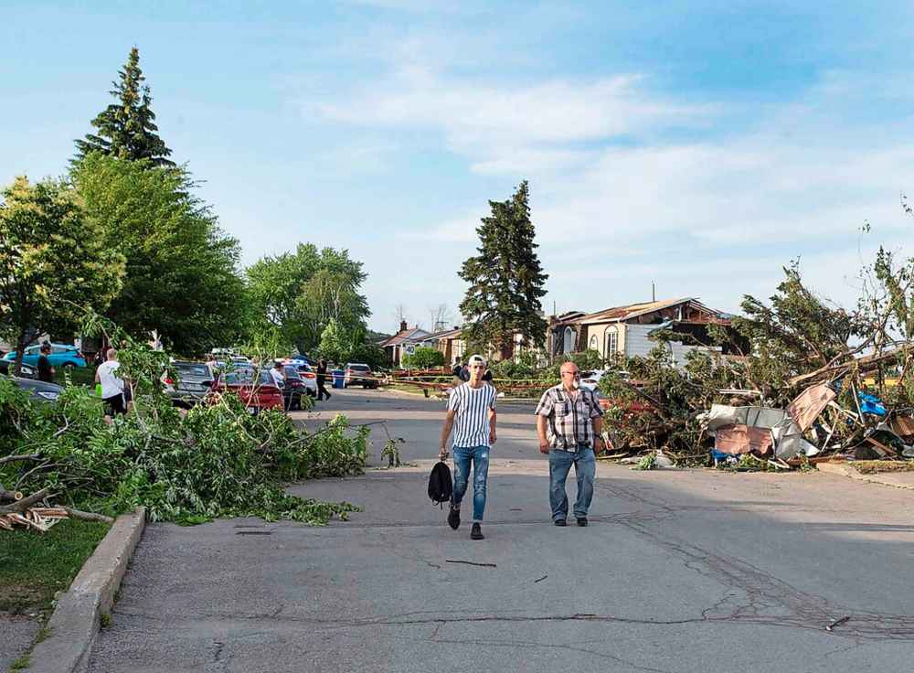 Cleanup of trees, debris underway after deadly Quebec tornado that