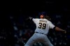 Milwaukee Brewers' Corbin Burnes pitches during the first inning of a baseball game against the Minnesota Twins, Saturday, April 3, 2021, in Milwaukee. (AP Photo/Aaron Gash)