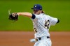 Milwaukee Brewers starting pitcher Corbin Burnes throws during the first inning of a baseball game against the Pittsburgh Pirates Friday, Aug. 28, 2020, in Milwaukee. (AP Photo/Morry Gash)