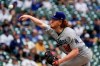 Los Angeles Dodgers' Dustin May throws during the first inning of a baseball game against the Milwaukee Brewers Saturday, May 1, 2021, in Milwaukee. (AP Photo/Morry Gash)