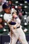 Milwaukee Brewers' Keston Hiura hits an RBI single during the sixth inning of a baseball game against the Chicago Cubs Monday, April 12, 2021, in Milwaukee. (AP Photo/Morry Gash)