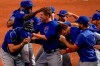 Chicago Cubs starting pitcher Alec Mills is swarmed by teammates after throwing a no hitter at a baseball game against the Milwaukee Brewers Sunday, Sept. 13, 2020, in Milwaukee. The Cubs won 12-0. (AP Photo/Morry Gash)