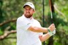 Shane Lowry, of Ireland, watches his drive on the second tee during the second round of the Workday Charity Open golf tournament, Friday, July 10, 2020, in Dublin, Ohio. (AP Photo/Darron Cummings)