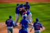 Chicago Cubs starting pitcher Alec Mills is swarmed by teammates after throwing a no hitter at a baseball game against the Milwaukee Brewers Sunday, Sept. 13, 2020, in Milwaukee. The Cubs won 12-0. (AP Photo/Morry Gash)