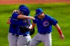 Chicago Cubs starting pitcher Alec Mills is congratulated by teammates catcher Victor Caratini and Anthony Rizzo after throwing a no hitter at a baseball game against the Milwaukee Brewers Sunday, Sept. 13, 2020, in Milwaukee. The Cubs won 12-0. (AP Photo/Morry Gash)