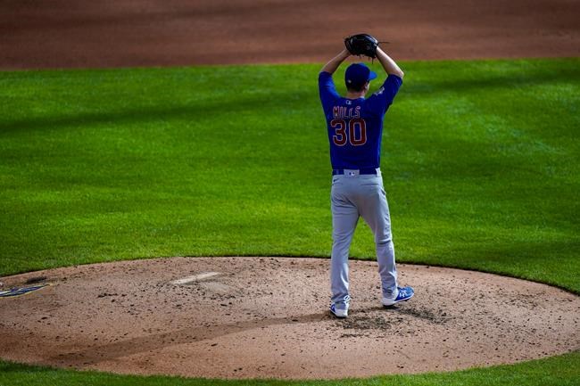 Chicago Cubs starting pitcher Alec Mills reacts after throwing a no hitter at a baseball game against the Milwaukee Brewers Sunday, Sept. 13, 2020, in Milwaukee. The Cubs won 12-0. (AP Photo/Morry Gash)
