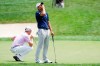Collin Morikawa reacts to a missed putt on the second playoff hole as Justin Thomas lines up his putt during the final round of the Workday Charity Open golf tournament, Sunday, July 12, 2020, in Dublin, Ohio. (AP Photo/Darron Cummings)