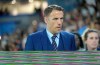 FILE - In this file photo dated Wednesday, March 7, 2018, England head coach Phil Neville walks onto the field before a SheBelieves Cup women's soccer match against the United States, in Orlando, USA. Neville will step down from coaching the England women's team when his contract expires next year, it is announced Friday April 24, 2020, missing out on leading the country at the rescheduled European Championship in 2022. (AP Photo/Phelan M. Ebenhack, FILE)