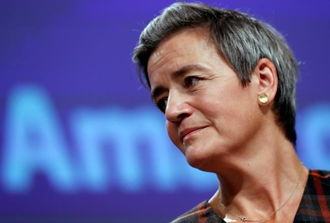 FILE - In this file photo dated Tuesday, Nov. 10, 2020, European Executive Vice-President Margrethe Vestager speaks during a press conference regarding an antitrust case with Amazon, at EU headquarters in Brussels. The European Court of Auditors, which has examined the EU's enforcement of competition rules by big tech companies over the past decade said Thursday Nov. 19, 2020, that antitrust investigations have taken too long, dulling their effectiveness, a report said Thursday. (Olivier Hoslet, Pool FILE via AP)