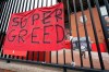 FILE - In this file photo dated Wednesday, April 21, 2021, a protest banner against the proposed Super League is seen outside Liverpool's Anfield Stadium after the collapse of English involvement in the proposed new league, Liverpool, England. The aborted plan to create a breakaway Super League with 12 of the biggest clubs in European soccer was perhaps the most egregious example of a sporting venture that quickly fell flat on its face. (AP Photo/Jon Super, FILE)