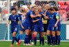 FILE - In this file photo dated Sunday, April 21, 2019, Chelsea's Erin Cuthbert, centre, and teammates celebrate scoring against Lyon during their Women's Champions League soccer match in Decines, France. The English Football Association’s board have decided to determine the final standings on a points-per-game basis, Friday June 5, 2020, naming Chelsea as Women’s Super League champions after the season was stopped because of the coronavirus pandemic. (AP Photo/Laurent Cipriani, FILE)