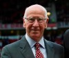 FILE - In this file photo dated Tuesday May 6, 2014, former soccer player Bobby Charlton at Old Trafford Stadium in Manchester, England. Manchester United and England soccer great Bobby Charlton has been diagnosed with dementia, it is revealed Sunday Nov. 1, 2020. (AP Photo/Jon Super, FILE)