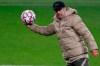 FILE - In this file photo dated Monday, Nov. 2, 2020, Atletico Madrid's head coach Diego Simeone attends a training session in Moscow, Russia. Diego Simeone’s Atletico Madrid will try to deal a severe blow to Real Madrid’s title defense on upcoming Sunday March 7, 2021. (Yuri Kochetkov/Pool FILE via AP)