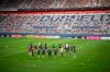 German national soccer team players stand in an empty stadium during a team practice session ahead of their upcoming World Cup qualifier match against Iceland, at Merkur-Spiel-Arena in Duesseldorf, Germany, Tuesday March 23, 2021. (Federico Gambarini/dpa via AP)