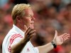 FILE - In this file photo dated Saturday, Aug. 6 2005, then Benfica's Dutch coach Ronal Koeman reacts during a friendly soccer match against Juventus, at Benfica's Luz stadium in Lisbon, Portugal. Netherlands national coach, 57-year old Ronald Koeman underwent a heart procedure Sunday May 3, 2020, at a hospital in Amsterdam after feeling pain in his chest, his management company said in a statement. (AP Photo/Armando Franca, FILE)